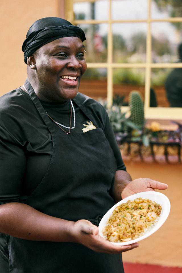 Chef Erica Griffin of Hannibal&#x002019;s Soul Kitchen with a plate of her signature shrimp and crab rice