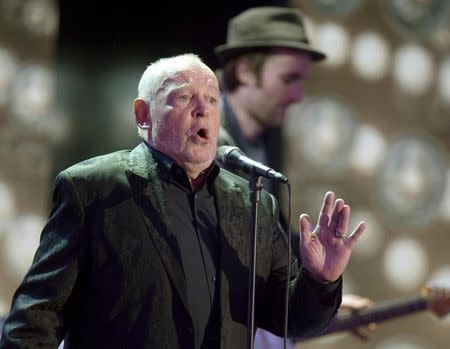 British singer Joe Cocker performs after receiving the trophy for Category ' lifetime achievement award music' during the 48th Golden Camera award ceremony in Berlin, February 2, 2013. REUTERS/Maurizio Gambarini/Pool