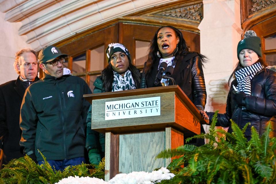 Michigan State University Board of Trustees Chair Rema Vassar, center, is joined by, from left, Vice Chair Dan Kelly, Trustee Dennis Denno, Trustee Brianna T. Scott and Trustee Kelly Tebay on Wednesday, Feb. 15, 2023, as Vassar speaks during a candlelight vigil honoring the victims of Monday's mass shooting on campus.