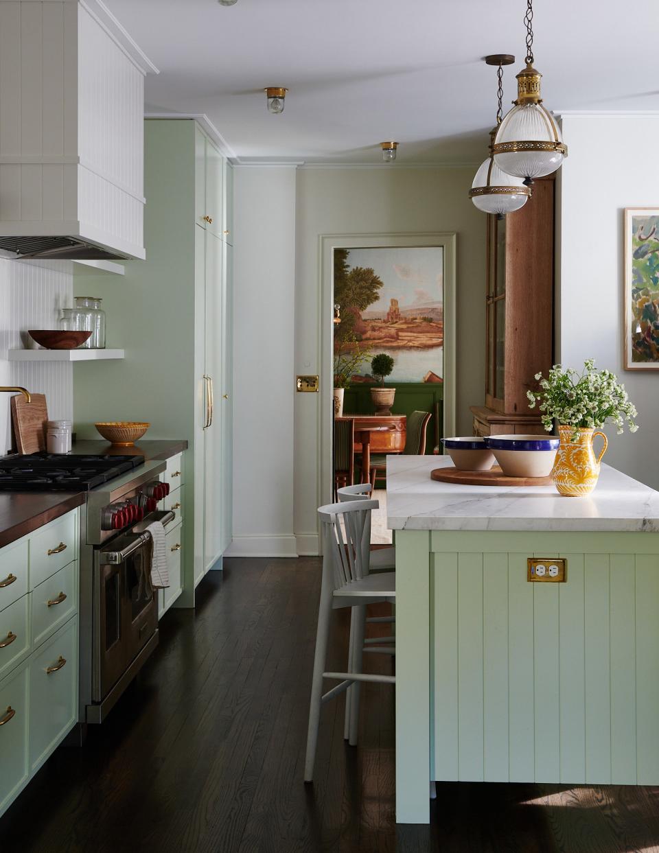 Although actor Casey Wilson was initially resistant to green tones, interior designer Todd Nickey eventually convinced her of the color’s allure. “It kind of reminds me of my grandmother and her house,” Wilson says of the mint green kitchen done in Portola Paints & Glazes “Margarita.” The countertops are Calacatta marble, the pendant lights are from Obsolete LA, and the breakfast bar chairs are from Anthropologie.