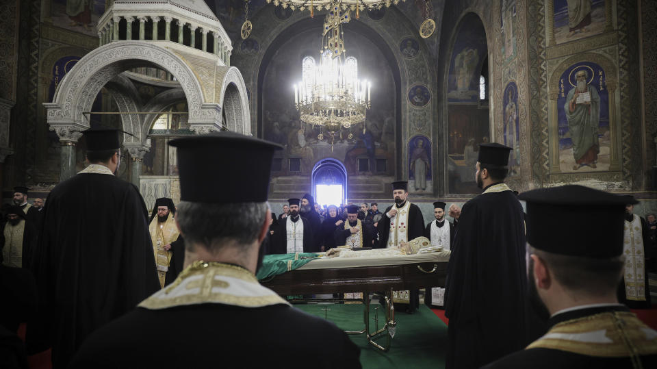 Bulgarian Orthodox Priests pay their last respects to Bulgarian patriarch Neophyte at the Alexander Nevsky Cathedral in Sofia, Friday, March 15, 2024. National mourning was declared by the Bulgarian government on March 15 and 16 to honour Patriarch Neophyte of Bulgaria. Neophyte who was the first elected head of the Orthodox Church in the post-communist Balkan country, died at a hospital in Sofia on March 13. He was 78. (AP Photo/Valentina Petrova)