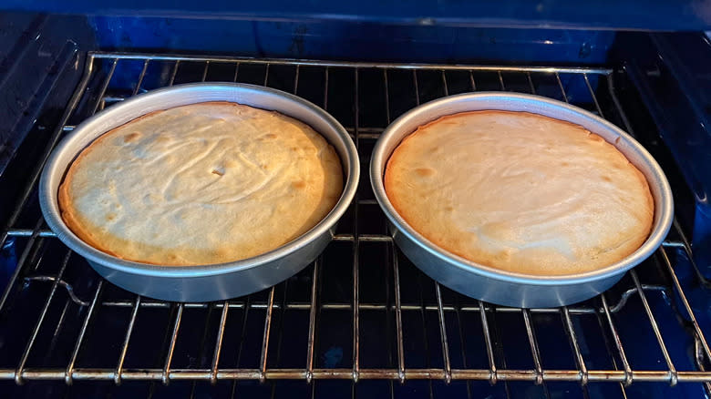 Bright and sunny lemon lavender cakes baking in oven in round pans