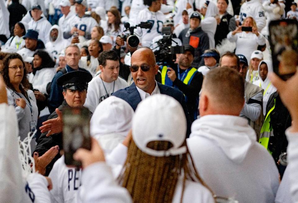 Penn State football coach James Franklin greets fans as he arrives for the White Out game against Iowa on Saturday, Sept. 23, 2023.