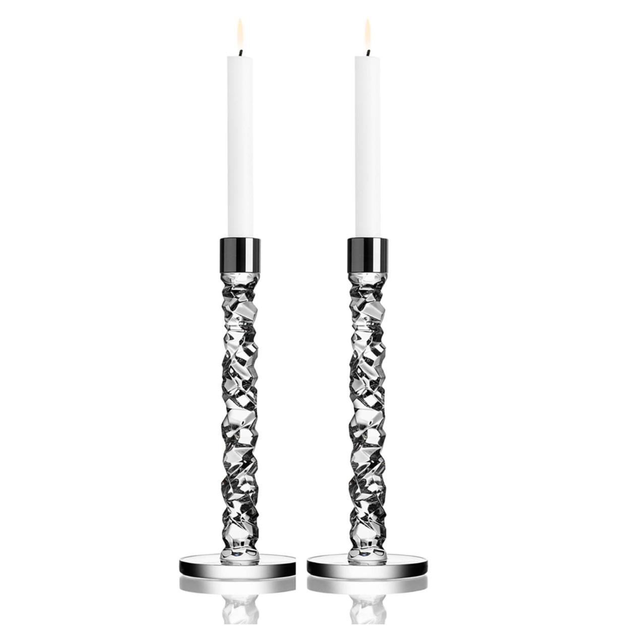 <p><a href="https://go.redirectingat.com?id=74968X1596630&url=https%3A%2F%2Fwww.neimanmarcus.com%2Fp%2Forrefors-carat-large-candlesticks-set-of-2-prod196440478&sref=https%3A%2F%2Fwww.townandcountrymag.com%2Fstyle%2Fhome-decor%2Fg37599279%2Fbest-wedding-gifts%2F" rel="nofollow noopener" target="_blank" data-ylk="slk:Shop Now;elm:context_link;itc:0;sec:content-canvas" class="link rapid-noclick-resp">Shop Now</a></p><p>Carat Large Candlesticks, Set of 2</p><p>neimanmarcus.com</p><p>$400.00</p>