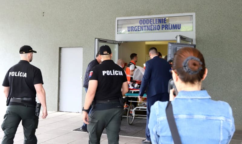 Rescue workers carry the shot and injured Slovakian Prime Minister Robert Fico on a stretcher to a hospital in Banska Bystrica. Fico was shot and injured after a cabinet meeting in the town of Handlova. Jan Kroslák/TASR/dpa