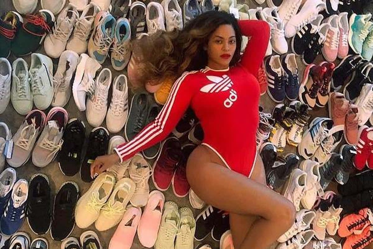 Beyoncé on top of dozens of pairs of sneakers as she teases her new Ivy Park range in collaboration with Adidas in November 2020 (instagram)