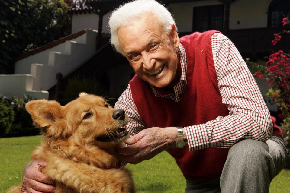 Long-time “Price is Right” game show host Bob Barker outside in the backyard of his historic home with his dog Jesse. Mandatory Credit: Robert Hanashiro-USA TODAY