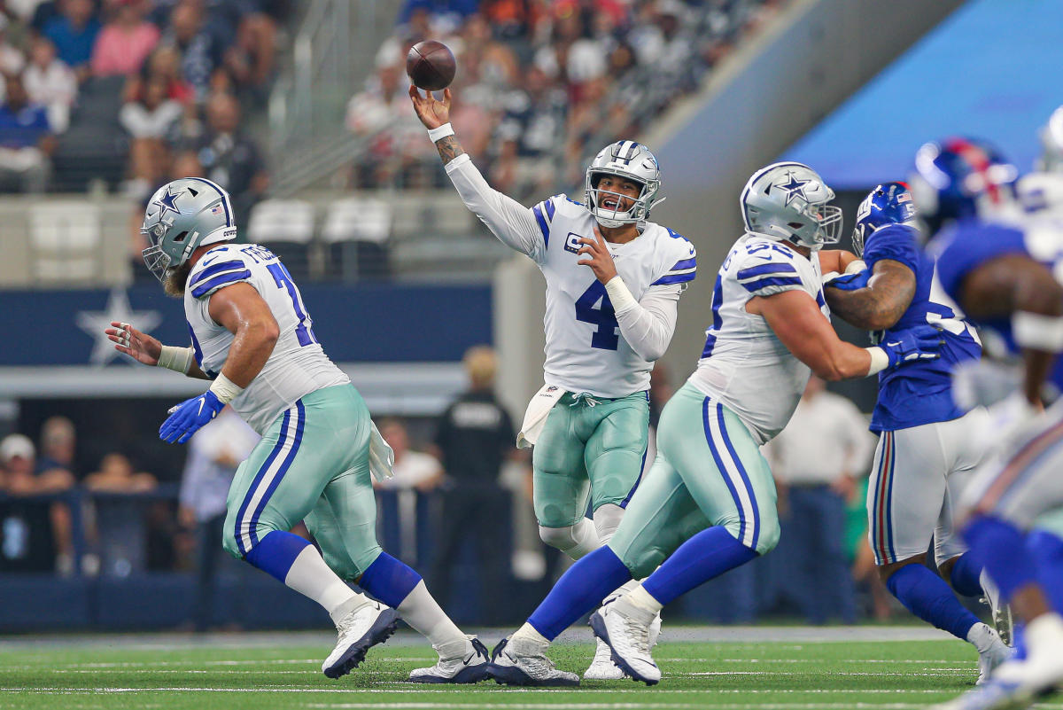 Cowboys training camp photos: Quarterback Dak Prescott rolls out to throw a  dime