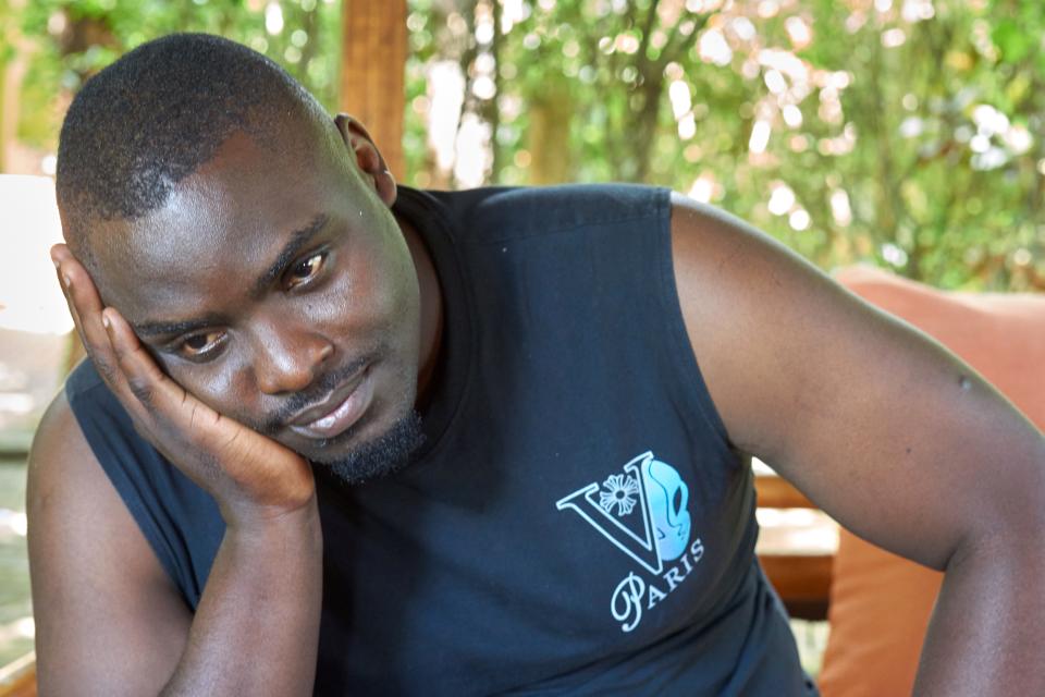 Henry Mukiibi, founder of Children of the Sun Foundation, in Entebbe, Uganda, says the foundation has received threats of violence from neighbors and on WhatsApp. People have thrown stones at Mukiibi’s house, making him feel unsafe sleeping there.