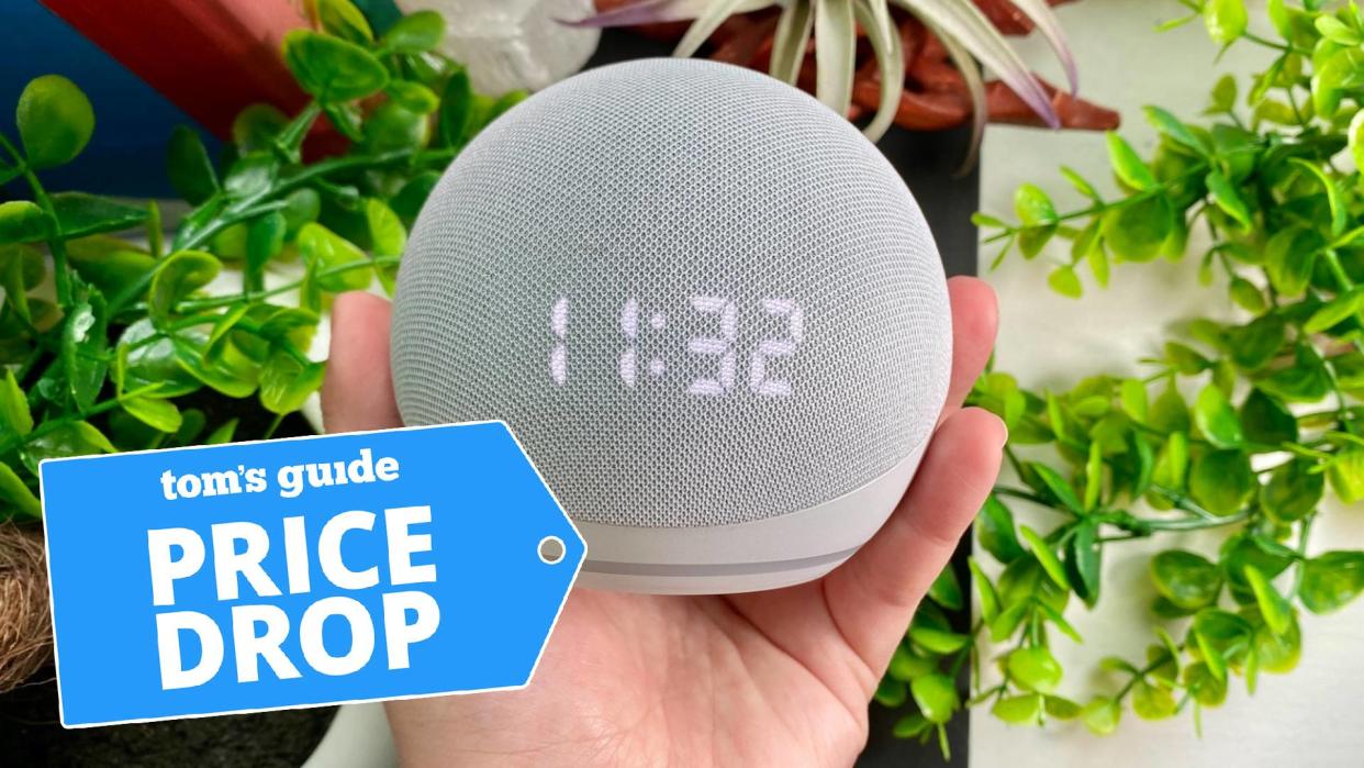  Echo Dot with Clock (5th Generation) in hand 