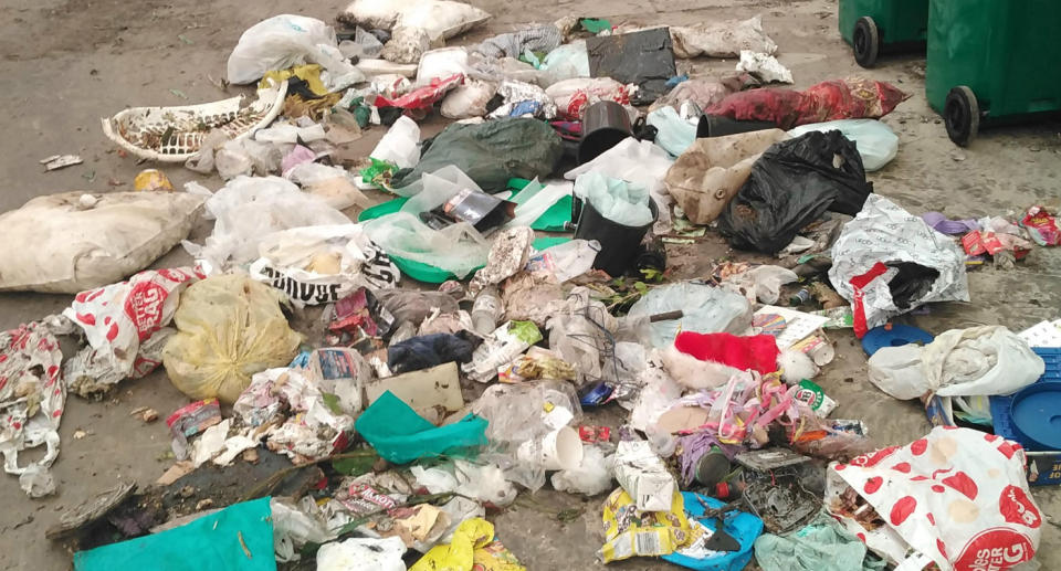 Garbage is pictured on the ground from the Byron Shire Council's food organics and garden organics bin collection.