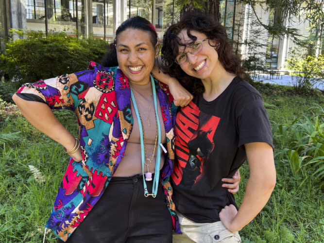 Joy Malak, left, changed her major as a freshman at the University of California, Santa Cruz, while balancing grades with work and school. Serena Ramirez says she is often so stressed out about her grades in class, “I can barely focus.” (Ki Sung/KQED)