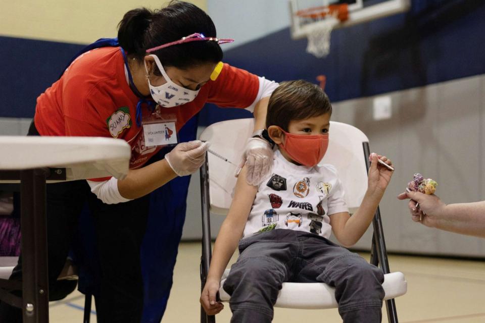 PHOTO: In this Dec. 5, 2021, file photo, a 5-year-old boy receives the Pfizer-BioNTech COVID-19 vaccine in Lansdale, Penn. (Hannah Beier/Reuters, FILE)