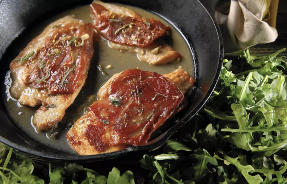 <p>For this saltimbocca-style chicken, after the chicken gets brown and crispy, add a slice of cheese over the cutlets for a rich, salty addition. To serve alongside, you can whip up an optional sauce using white wine, butter, lemon and fresh sage. </p> <p><a href="https://www.thedailymeal.com/best-recipe/chicken-cutlets-saltimbocca-style?referrer=yahoo&category=beauty_food&include_utm=1&utm_medium=referral&utm_source=yahoo&utm_campaign=feed" rel="nofollow noopener" target="_blank" data-ylk="slk:For the Chicken Cutlets Saltimbocca-Style With Sage Butter Pan Sauce and Arugula recipe, click here.;elm:context_link;itc:0;sec:content-canvas" class="link ">For the Chicken Cutlets Saltimbocca-Style With Sage Butter Pan Sauce and Arugula recipe, click here. </a></p>