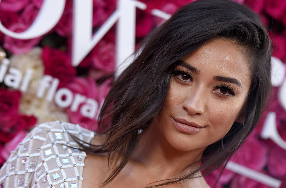 We’re pretty sure this is the sweater of the year, and Shay Mitchell agrees