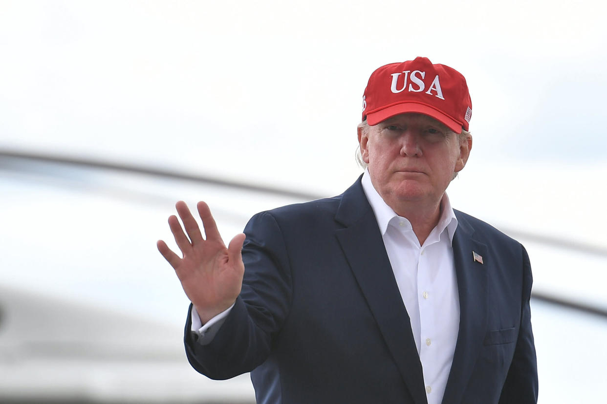 US President Donald Trump gestures as he and First Lady Melania Trump (not pictured) make their way to board Air Force One at Shannon Airport in County Clare, Ireland on June 7, 2019, for their return trip to Washington DC. (Photo by MANDEL NGAN / AFP)        (Photo credit should read MANDEL NGAN/AFP/Getty Images)