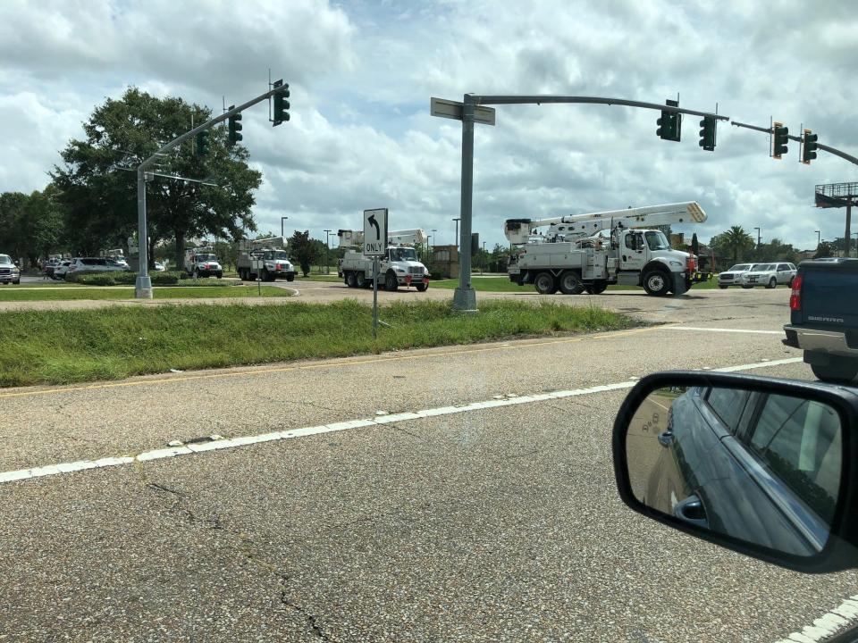 Power trucks in the aftermath of Hurricane Laura in Lafayette, Louisiana, in August 2020.