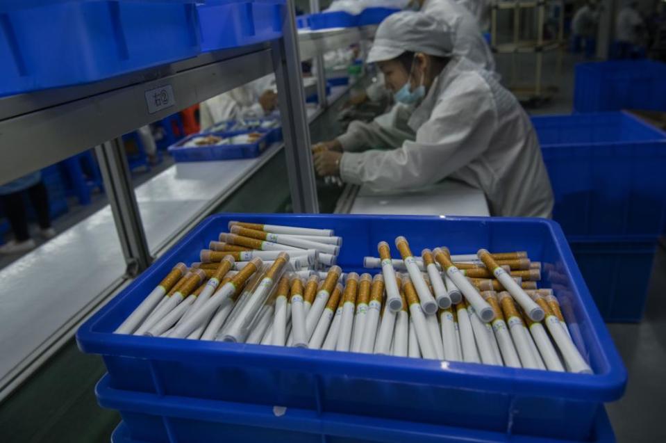 Workers box e-cigarettes on the production line at First Union, one of China’s leading manufacturers of vaping products.