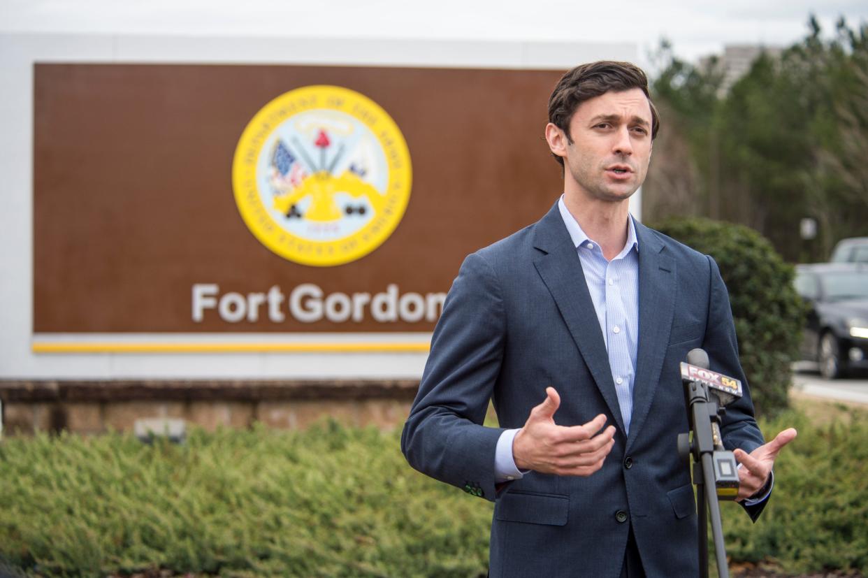 FILE - Georgia U.S. Sen. Jon Ossoff talks to reporters just outside Fort Gordon, near Augusta, Ga., after touring the facility Friday afternoon February 19, 2021. Ossoff recently announced plans for the fort to conduct unit by unit inspections of privatized housing on base.