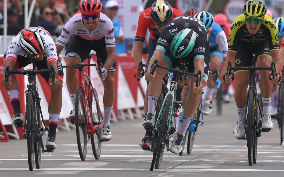 Fernando Gaviria (left) dips for the line to win the opening stage at the Tour of Guangxi - 2019 Getty Images