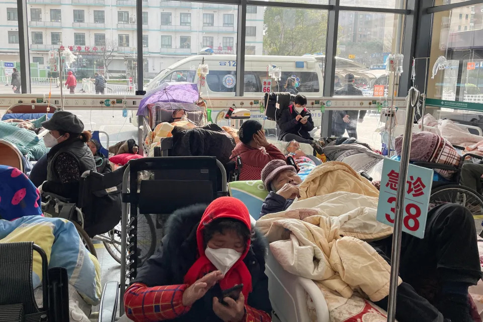 Patients lie on beds in the emergency department of a hospital, amid the coronavirus disease (COVID-19) outbreak in Shanghai, China, January 5, 2023. REUTERS/Staff