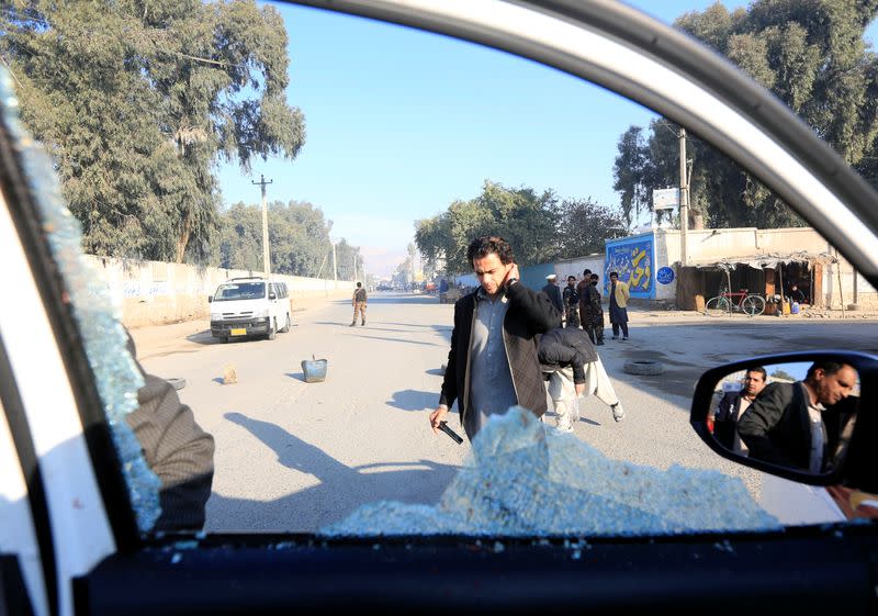 A broken window of the vehicle that was carrying Japanese doctor Tetsu Nakamura during the attack is seen in Jalalabad