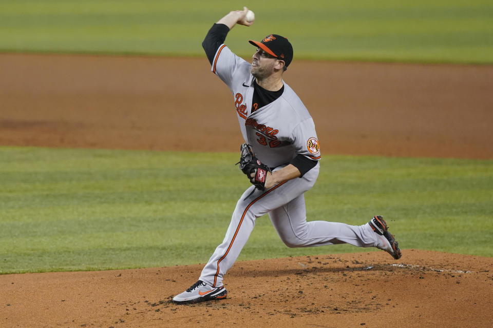 Baltimore Orioles starting pitcher Matt Harvey (32) throws a pitch during the first inning of a baseball game against the Miami Marlins, Tuesday, April 20, 2021, in Miami. (AP Photo/Marta Lavandier)