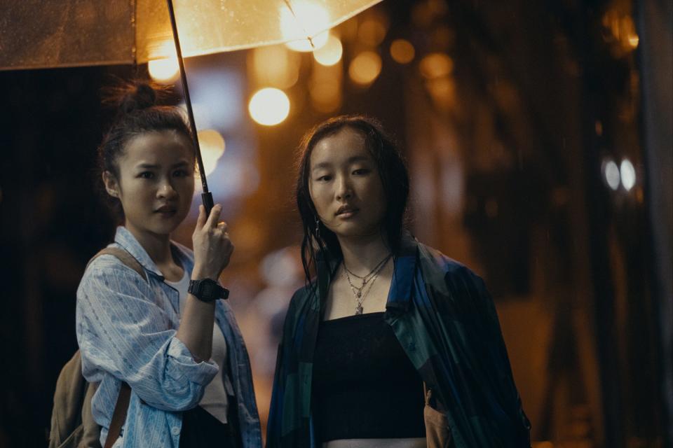 Charly (Bonde Sham, left) and Mercy (Ji-young Yoo) are friends-turned-girlfriends in "Expats."