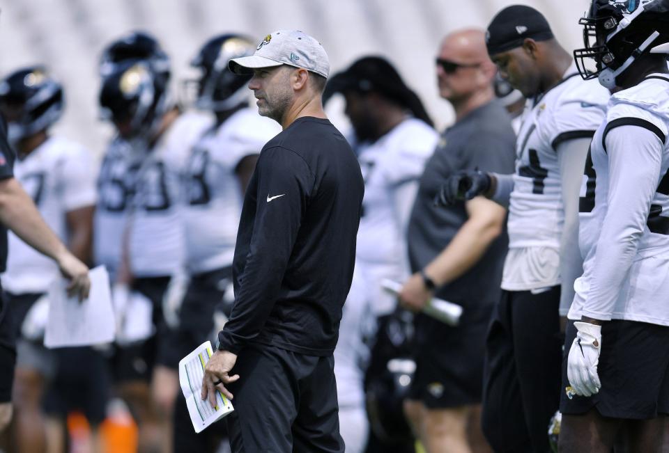 Outside linebackers coach Bill Shuey watches his players go through drills during Monday's offseason camp. Rookies and veterans gathered at TIAA Bank Field Monday, May 22, 2023 for the start of the Jacksonville Jaguars offseason camp. [Bob Self/Florida Times-Union]