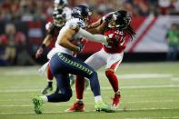 <p>Jalen Collins #32 of the Atlanta Falcons tackles Jermaine Kearse #15 of the Seattle Seahawks at the Georgia Dome on January 14, 2017 in Atlanta, Georgia. (Photo by Kevin C. Cox/Getty Images) </p>