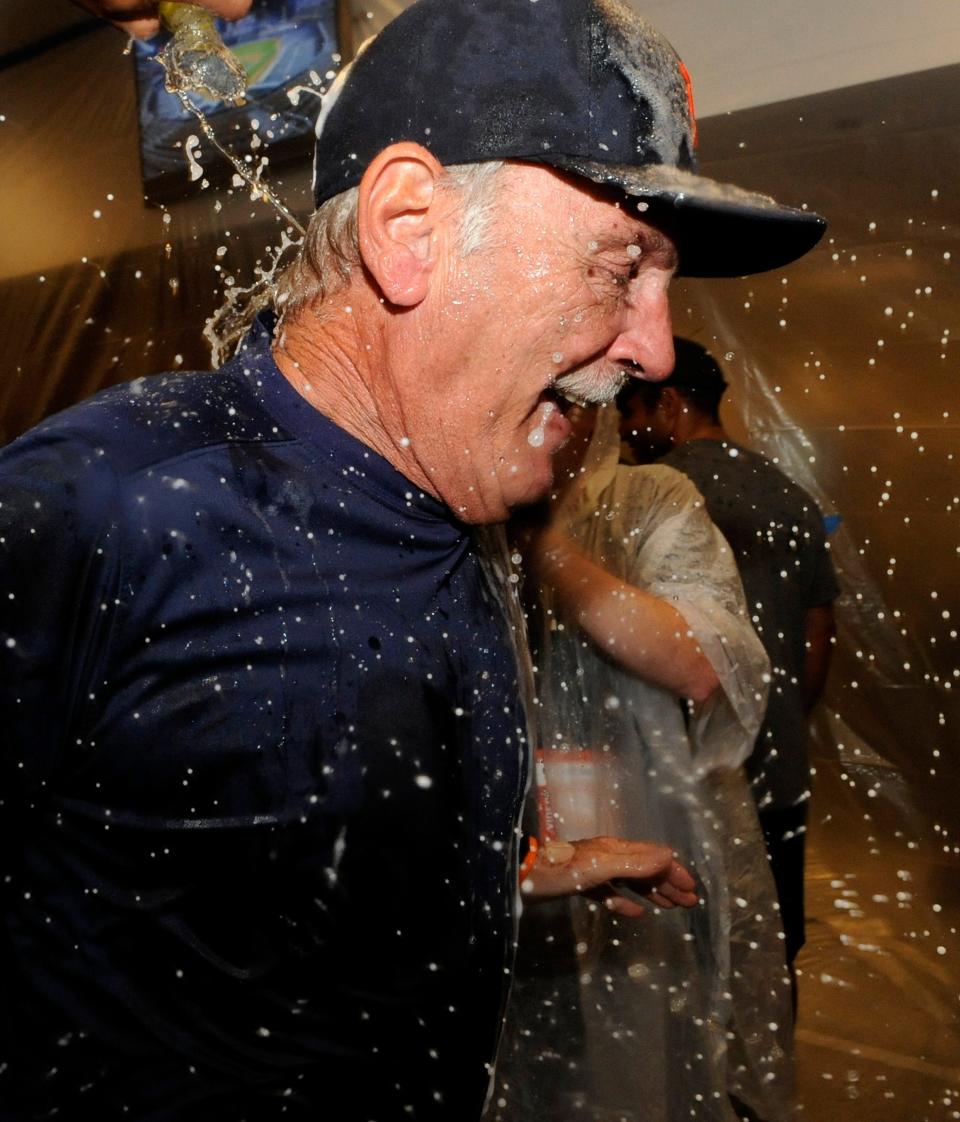 Jim Leyland of the Detroit Tigers celebrates with champagne in the clubhouse after the Tigers defeated the Twins 1-0 on September 25, 2013 at Target Field in Minneapolis, Minnesota. The Tigers clinched the American League Central Division title.