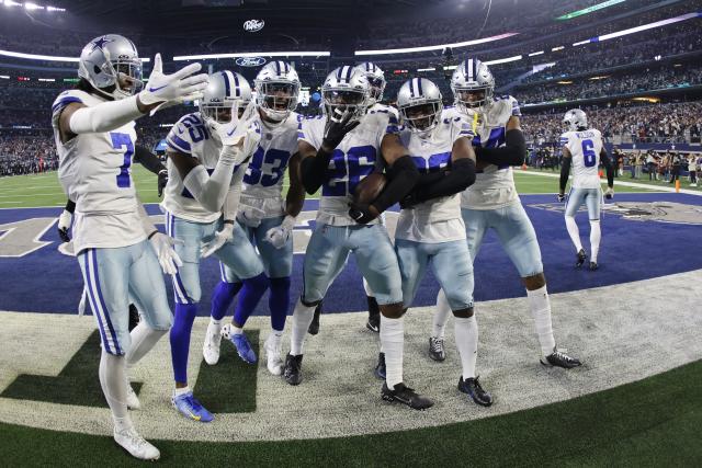 Arlington, United States. 24th Dec, 2022. Dallas Cowboys Dak Prescott rolls  out agains tthe Philadelphia Eagles during their NFL game at AT&T Stadium  in Arlington, Texas on Saturday, December 24, 2022. The