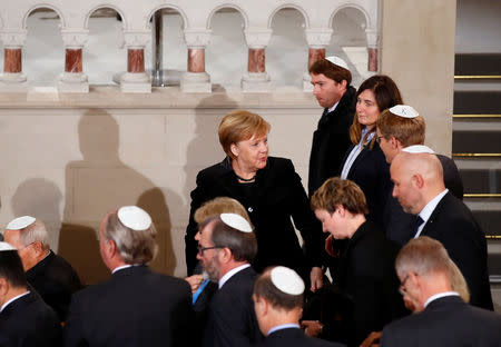 German Chancellor Angela Merkel is pictured after speaking at a ceremony to mark the 80th anniversary of Kristallnacht, also known as Night of Broken Glass, at Rykestrasse Synagogue, in Berlin, Germany, November 9, 2018. REUTERS/Axel Schmidt