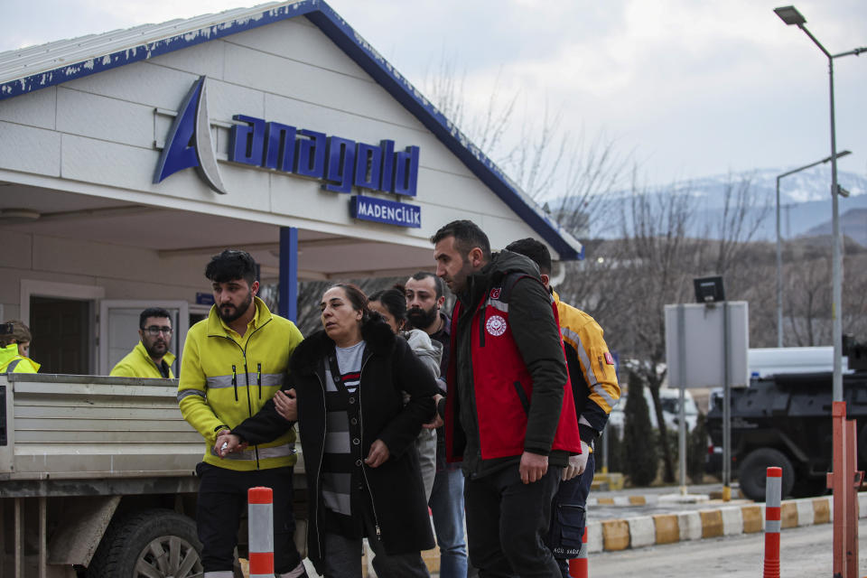 Relatives of missing miners leave the Copler gold mine near Ilic village, eastern Turkey, Wednesday, Feb. 14, 2024. Hundreds of rescuers on Wednesday pressed ahead with efforts to search for several workers trapped at a gold mine in eastern Turkey that was engulfed by a massive landslide. (Ugur Yildirim/Dia images via AP)