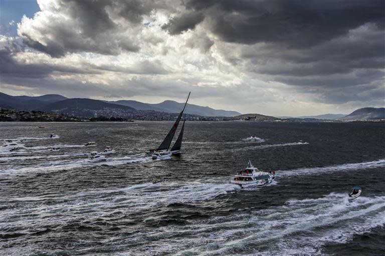 This handout image of the Rolex Sydney Hobart Yacht Race event, released by regattanews.com and taken by Carlo Borlenghi on December 28, 2013 shows Wild Oats XI tackling the Derwent River