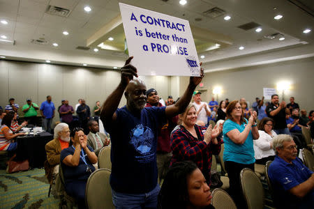 Leonard Smalls of The International Longshoremen's Association, shows his support during a rally held by The International Association of Machinists and Aerospace Workers for Boeing South Carolina workers before Wednesday's vote to organize, in North Charleston, South Carolina, U.S. February 13, 2017. REUTERS/Randall Hill