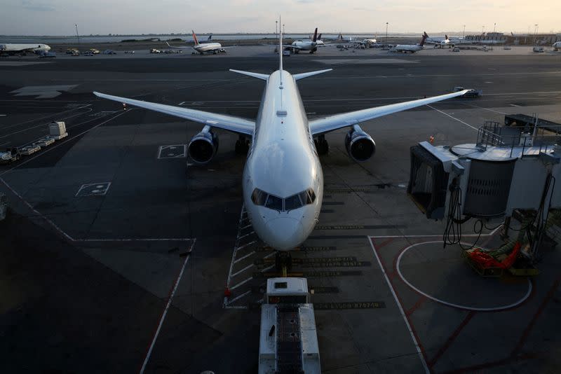 FILE PHOTO: An airplane sits on the tarmac at John F. Kennedy International Airport on the July 4th weekend in Queens, New York City