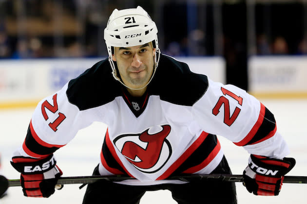 NEW YORK, NY – APRIL 04: Scott Gomez #21 of the New Jersey Devils looks on against the New York Rangers during a game at Madison Square Garden on April 4, 2015 in New York City. (Photo by Alex Trautwig/Getty Images)