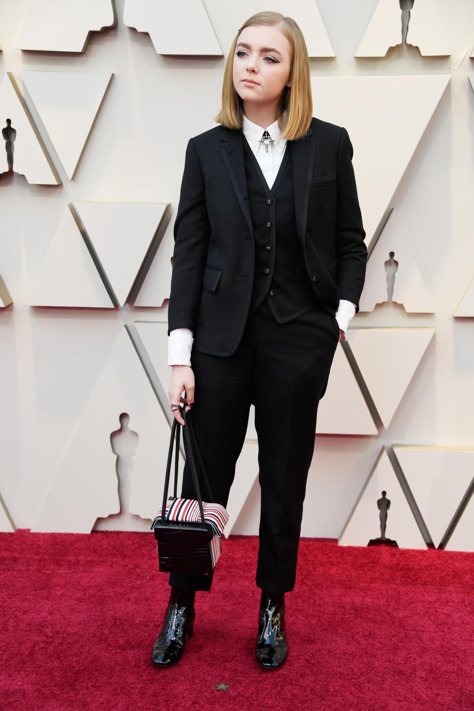 <h1 class="title">Elsie Fisher in Thom Browne</h1><cite class="credit">Photo: Getty Images</cite>