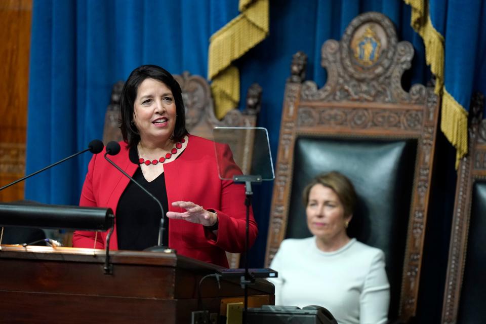 Mass. Lt. Gov. Kim Driscoll, left, delivers her inaugural address as Gov. Maura Healey looks on Thursday.