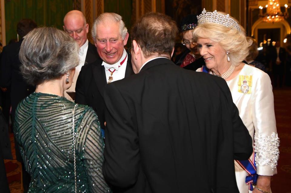 <p>Charles and Camilla greet guests at the reception.</p>