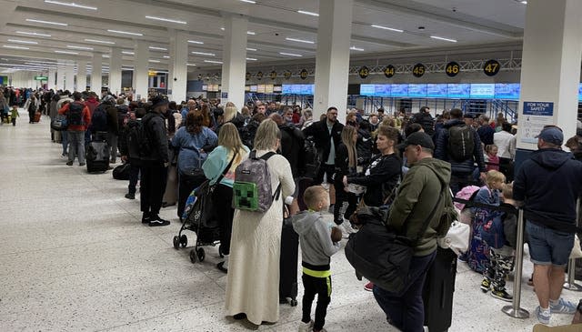 A queue of airline passengers