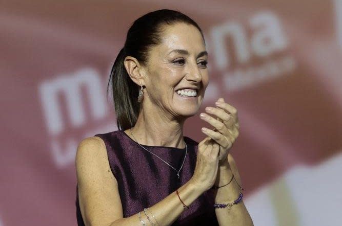 Former Mexico City Mayor Claudia Sheinbaum celebrates her appointment as the 2024 presidential candidate for the ruling Morena party during a press conference in Mexico City on Wednesday. Photo by Jose Mendez/EPA-EFE