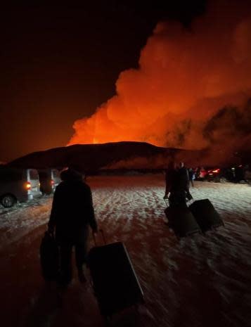 A view of the eruption from the parking lot of the hotel where the group was evacuated from.