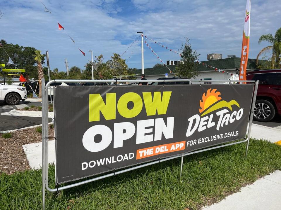 On the lawn of Bradenton’s first Del Taco fast food restaurant on Manatee Ave., now open sign.