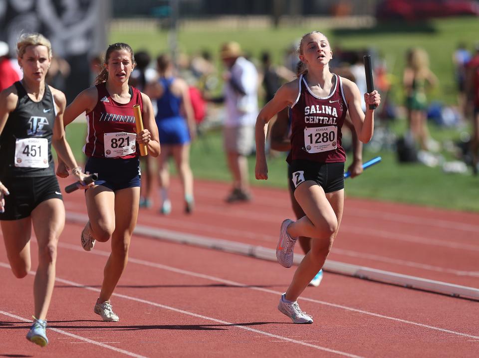 Salina Central's Elle Denning finishes the Class 5A 4x100-meter relay preliminaries in the state track and field meet Friday, May 27, 2022, at Cessna Stadium in Wichita.