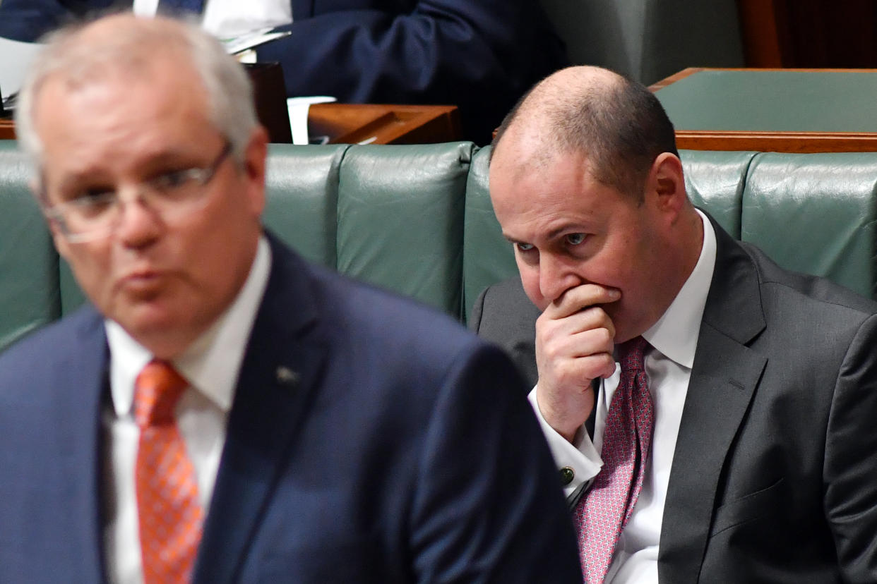 CANBERRA, AUSTRALIA - JUNE 11: Treasurer Josh Frydenberg reacts as Prime Minister Scott Morrison speaks at the despatch box during Question Time in the House of Representatives at Parliament House on June 11, 2020 in Canberra, Australia. An OECD report forecasted that the global economy will contract 6% in 2020, and 7.6% if there is a second wave of Covid-19 infections and that the pandemic has triggered the most severe peace-time recession in nearly a century. (Photo by Sam Mooy/Getty Images)