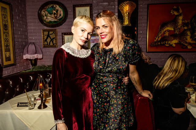 <p>Roger Kisby/WWD via Getty</p> Michelle Wiliams and Busy Philipps in Beverly Hills in December 2023