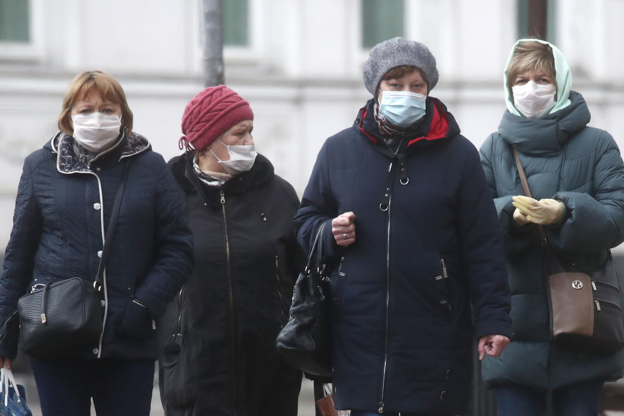 MOSCOW, RUSSIA - APRIL 15, 2020: Women walking in a street. Since 30 March 2020, Moscow has been on lockdown. Earlier, the Russian government announced a paid period off work for employed people and school holidays, which are expected to last till the end of April. As of 15 April 2020, Russia has reported more 24,500 confirmed cases of the novel coronavirus infection, with more than 14,800 confirmed cases in Moscow. Sergei Fadeichev/TASS (Photo by Sergei Fadeichev\TASS via Getty Images)