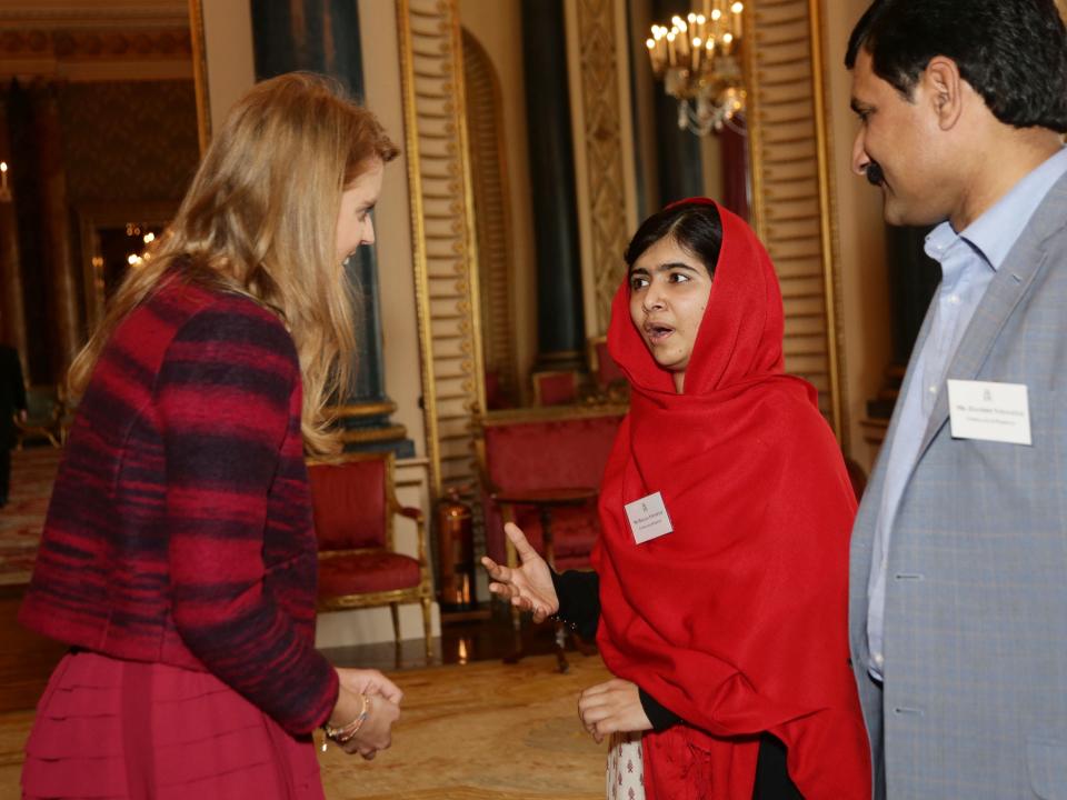 Princess Beatrice speaks with Malala Yousafzai.